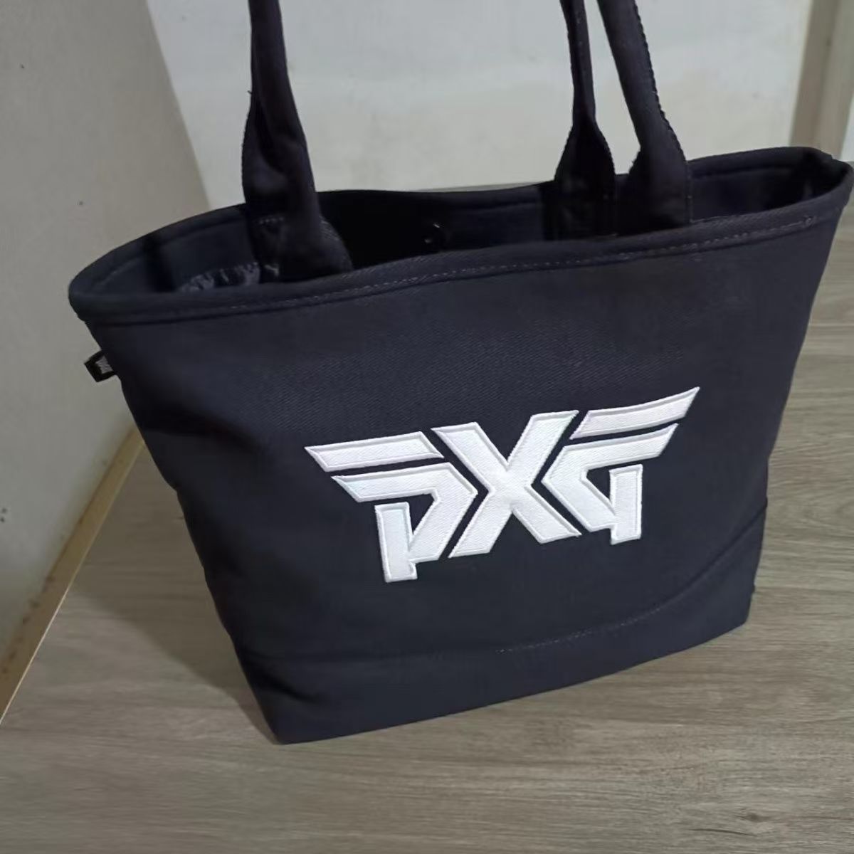 PX1001-TB 블릭&화이트로고 PXG 토트백 60000원